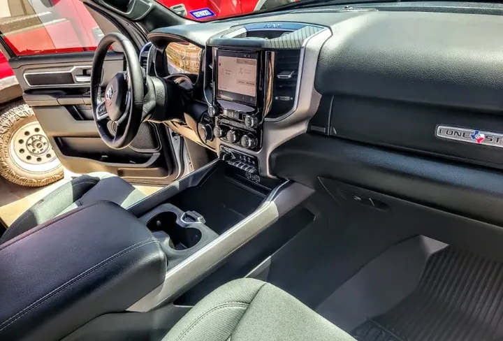 Detailed Ram 1500 interior with cleaned dash, console and seats